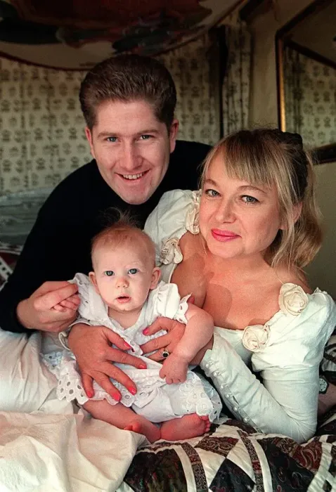 Framed Print : Actress Nicola Duffett with husband Ian Henderson 1995 and baby at home