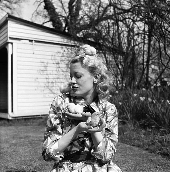 Actress Pat Dainton with Easter Chicks. April 1950 O23473-001