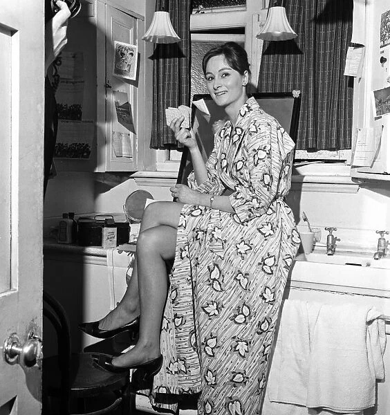 Actress Rosalind Worth backstage at the Ambassadors Theatre in London before her