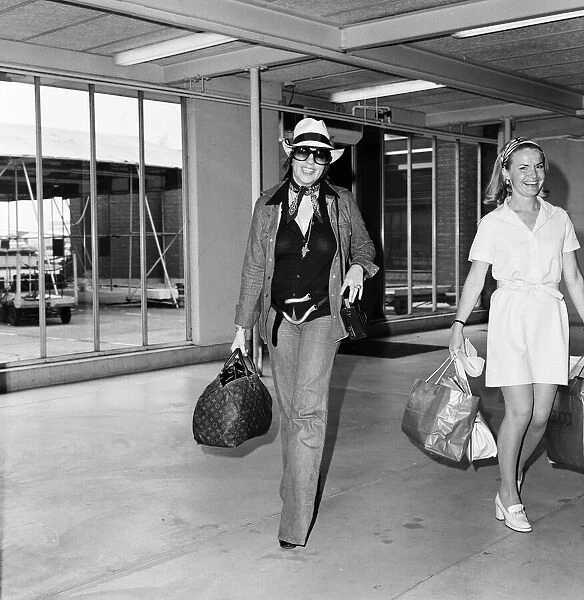 Actress and singer Liza Minnelli arrives at Heathrow Airport. 27th June 1973