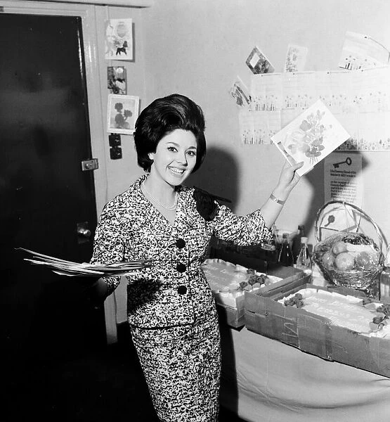 Actress and singer Susan Maughan, celebrates her 21st birthday in her dressing room at