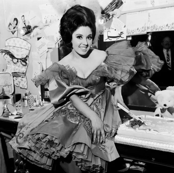 Framed Print : Actress and singer Susan Maughan, celebrates her 21st birthday in her dressing room Framed Print : Actress and singer Susan Maughan, celebrates her 21st birthday in her dressing room