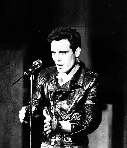 Adam Ant the 1980s British pop singer sings wearing a leather jacket - Stuart Goddard