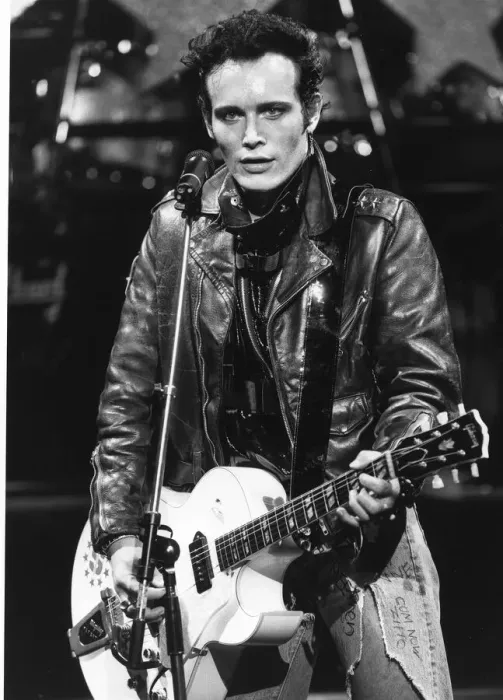 Framed Print : Adam Ant British pop singer playing guitar on stage 1985