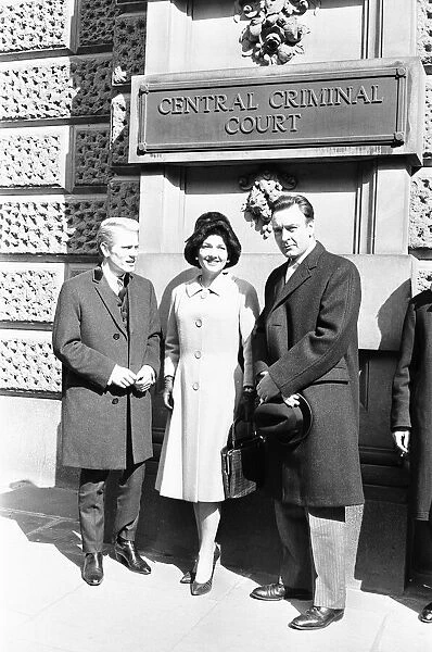Adam Faith (left), Anne Baxter and Donald Sinden pose outside the Central Criminal Court