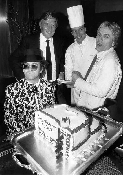 Adam Faiths Cake at the Savoy: Elton John, Michael Parkinson