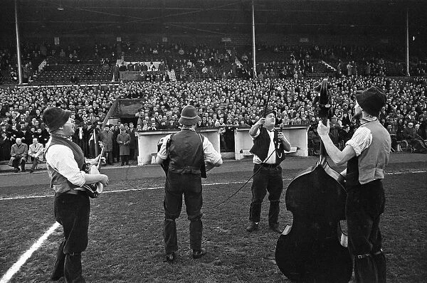 Adge Cutler and The Wurzels perform before the fans at the Bristol City ground