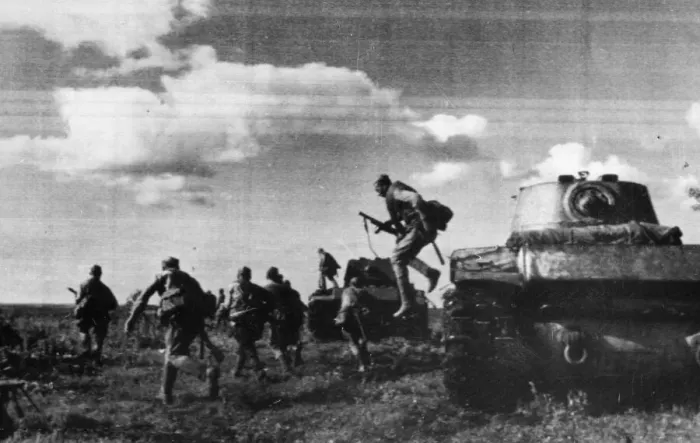 Framed Print : Ae Soviet Red Army raiding party leaping from a tank which carried it into enemy lines