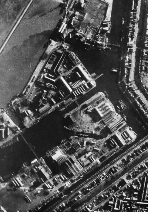 Framed Print : Aerial photograph taken from a RAF Venturas during a daylight raid on the docks at Den Framed Print : Aerial photograph taken from a RAF Venturas during a daylight raid on the docks at Den