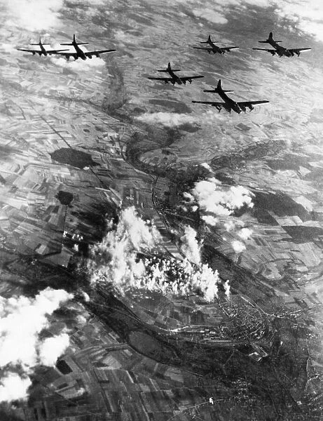 Aerial view of B17 Fortress bombers of the US 8th Air Force plastering another Nazi