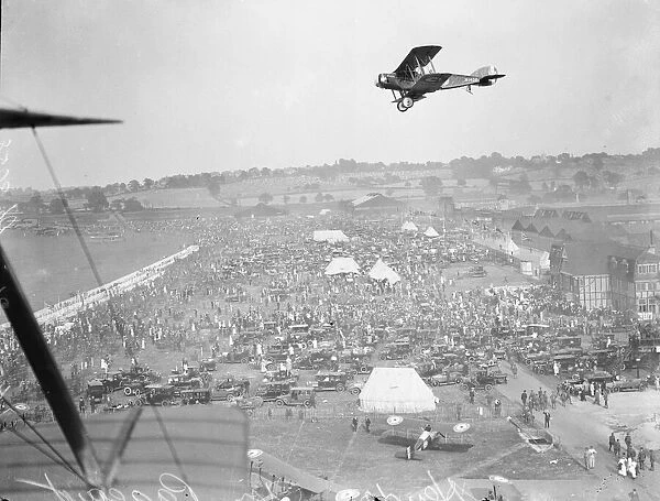 Aerial view of Hendon Air Pageant as a RAF Bristol F. 2 Fighter over flies the crowd