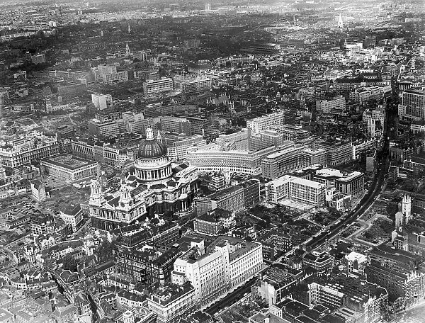 An aerial view of London showing St Pauls Cathedral flanked by some of the new office