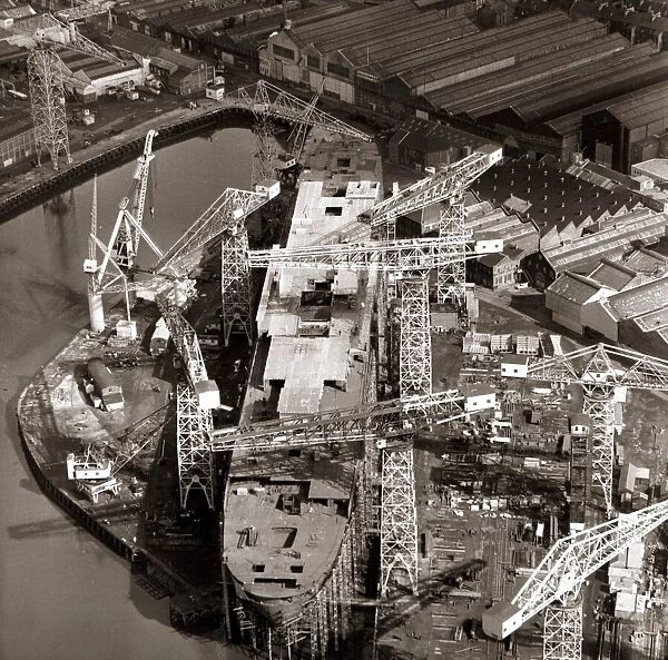 An aerial view showing the luxury liner QE2 under construction at John Browns Shipyard