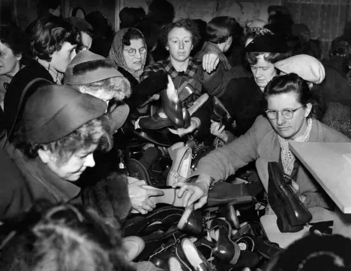 Framed Print : Affleck and Brown sales: Shoes at give away prices was the target of these women as they Framed Print : Affleck and Brown sales: Shoes at give away prices was the target of these women as they