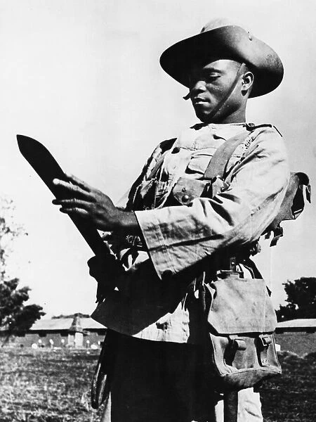 African soldier armed with a machete in Nyasaland (Malawi) during the Second World War