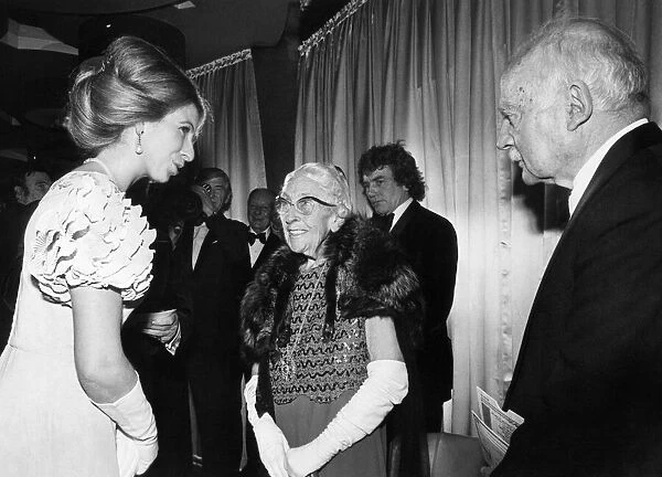 Agatha Christie and husband Max Mallowan meet Princess Anne. 21st November 1974