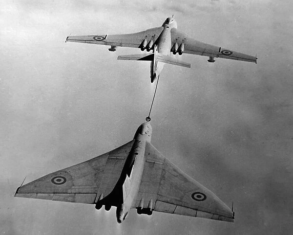 An air to air picture of a Vickers Valiant tanker refuelling Avro Vulcan Bomber in