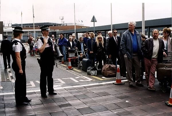Air Passengers at Airport amid flight delays April 1996