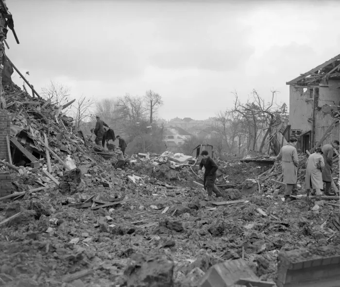 Framed Print : Air Raid Damage in Bristol Civilians searching through rubble of their bomb damaged Framed Print : Air Raid Damage in Bristol Civilians searching through rubble of their bomb damaged