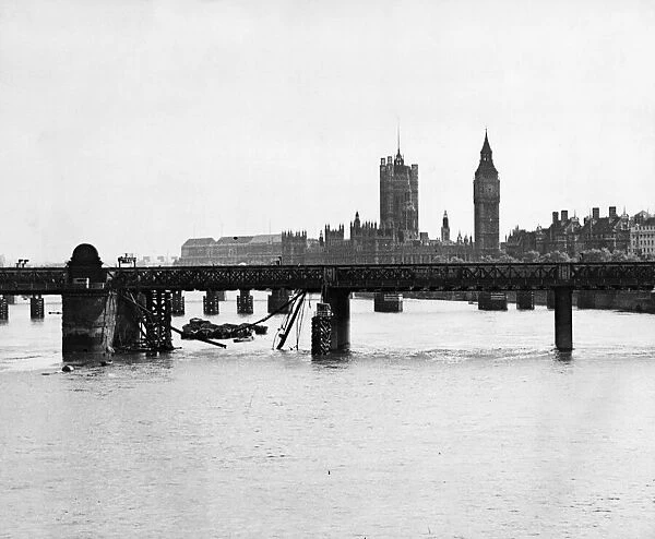 Air raid damage in London. A railway bridge damaged during a daylight raid by Hitler