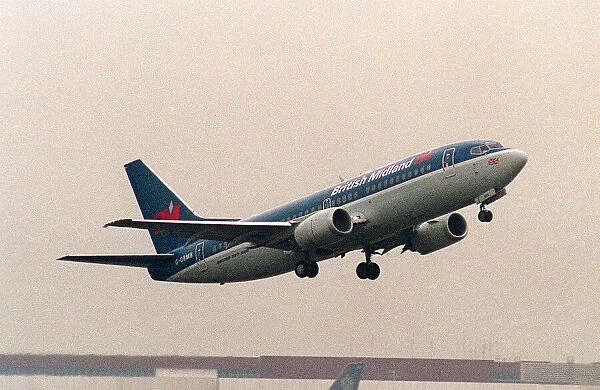 Aircraft Boeing 737-300 of BMA British Midland Airways Nov 92 taking off at Heathrow