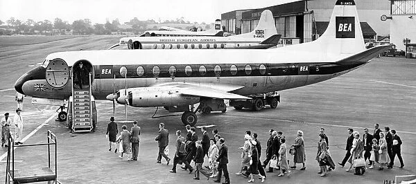 Aircraft line up at Elmdon airport as Midland holidaymakers queue to join a plane for