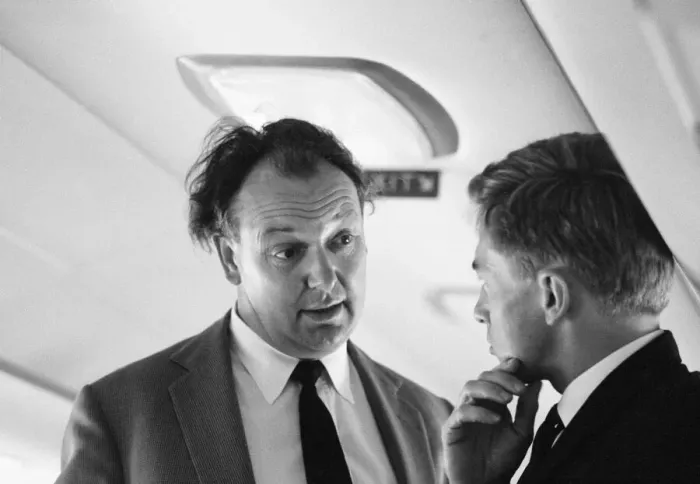 Framed Print : Airline chief Freddie Laker, head of Laker Airways, pictured talking to one of his staff Framed Print : Airline chief Freddie Laker, head of Laker Airways, pictured talking to one of his staff