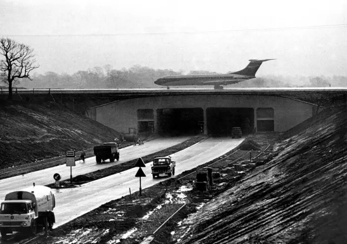Framed Print : An airliner on Manchester Airports new main runway extension which bridges Framed Print : An airliner on Manchester Airports new main runway extension which bridges