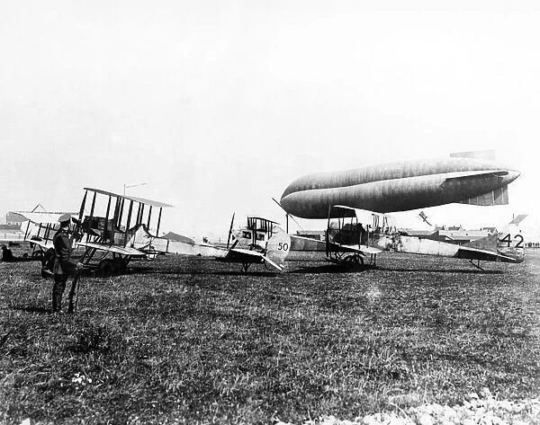 An airship guarding planes of the Royal Naval Air Service Eastchurch squadron near Ostend