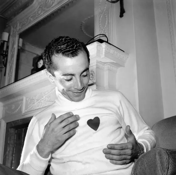 Framed Print : Al Martino admires his new sweater. June 1953 D2956-002