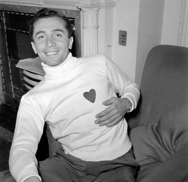 Al Martino admires his new sweater. June 1953 D2956-001