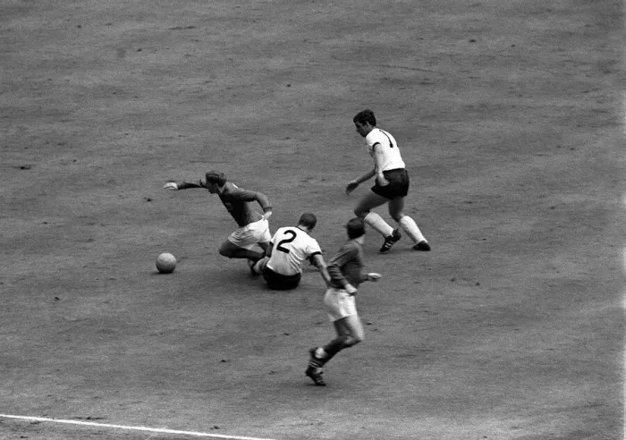 Framed Print : Alan Ball of England goes past West German defenders during the 1966 World Cup Framed Print : Alan Ball of England goes past West German defenders during the 1966 World Cup