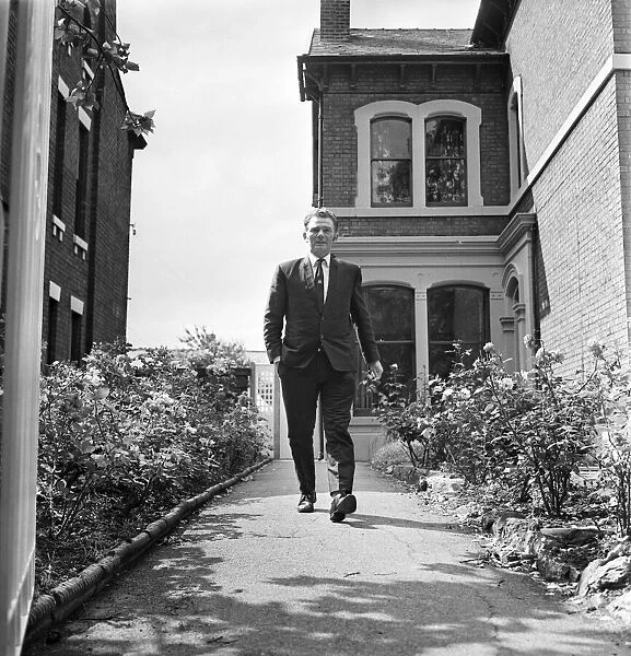Alan Ball walks away from the new Preston North End Youth Hostel. July 1970 70-6825