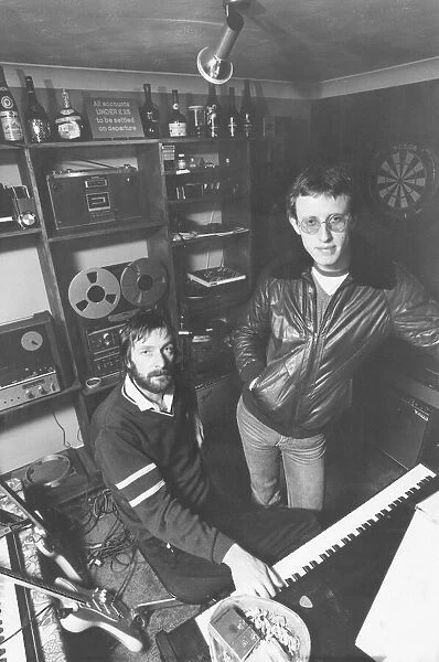 Alan Hull (seated) and Ray Laidlaw of the pop group Lindisfarne. 25  /  11  /  80