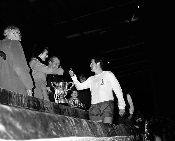 Alan Mullery of Tottenham Hotspur - February 1971 collecting winning League Cup