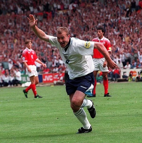 Alan Shearer celebrates Englands opening goal during the 1996 European Soccer