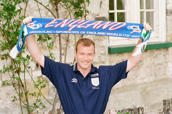 Alan Shearer holding an England scarf. 29th April 1997
