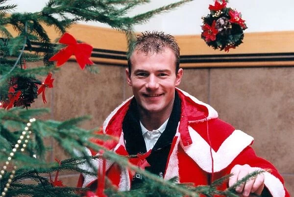 Alan Shearer taking on the role of Santa Claus