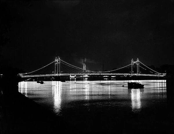 The Albert bridge illuminated at night in London 1951 bridge bridges engineering