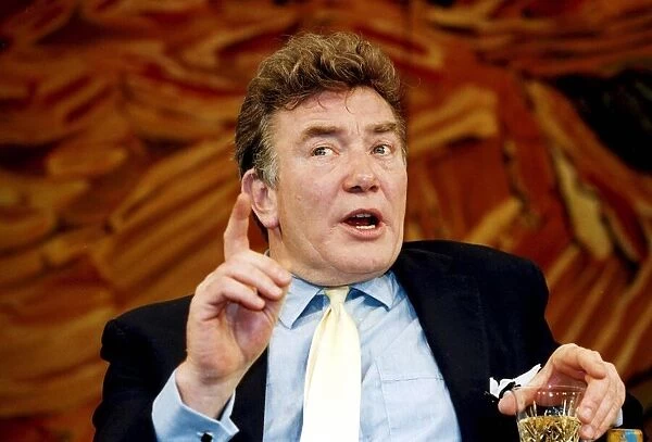Albert Finney holding drink acting in play Reflected Glory