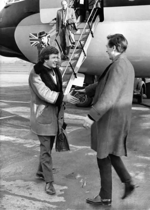 Framed Print : Albert Finney seen here being greeted on the apron of Manchester airport Framed Print : Albert Finney seen here being greeted on the apron of Manchester airport