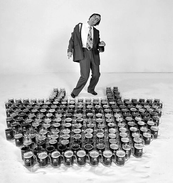 Albert Foster Staff Photographer with two hundred pints of beer