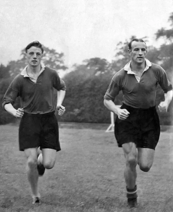 Framed Print : Albert Scanlon (left) and Allenby Chilton of Manchester United in training Framed Print : Albert Scanlon (left) and Allenby Chilton of Manchester United in training