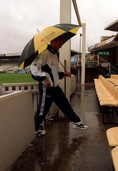 Framed Print : Alec Stewart England Cricket Captain June 1998 walks under an umbrella Framed Print : Alec Stewart England Cricket Captain June 1998 walks under an umbrella