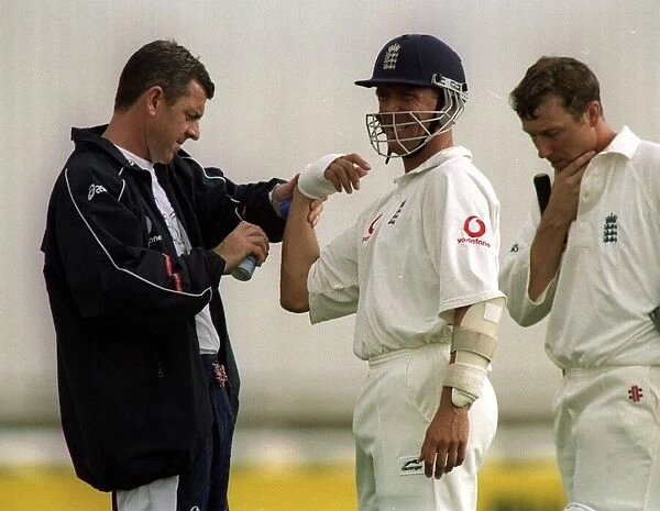 Alec Stewart Gets Treatment From Physiotherapist Wayne Morton After Hurting His Arm In