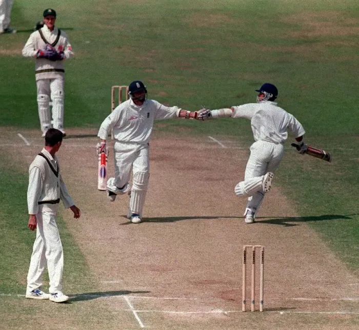 Framed Print : Alec Stewart and Mike Atherton Cricket players July 1998 touch hands during