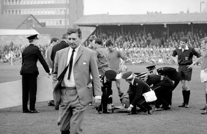 Framed Print : Alec Stock Manager of QPR - April 1968 walking away from injured player Morgan