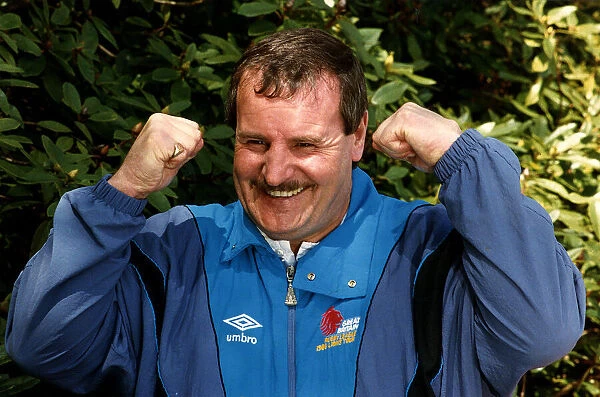 Alex Murphy Rugby League coach wearing umbro tracksuit and holding fists up
