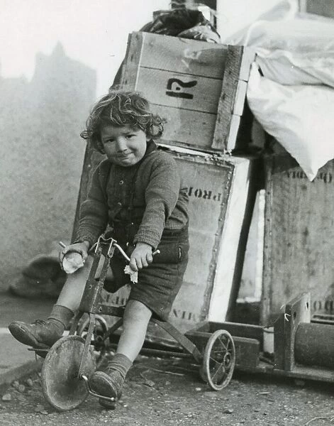 Alex Ross riding his tricycle December 1943 Evacuation story from North east
