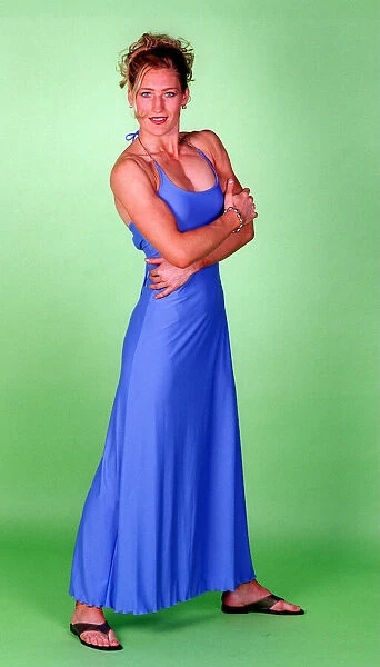 Ali Paton Gladiator Siren July 1997 Wearing long sky blue dress and sandals